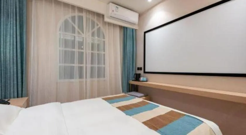 Bed in VX Hotel Beijing Daxing Wufutang Metro Station Zhongke Dianshanggu