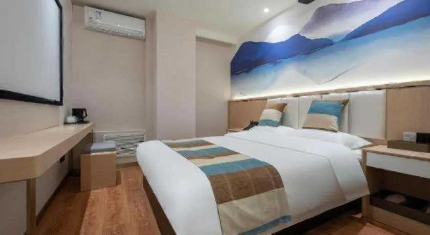 Bed in VX Hotel Beijing Daxing Wufutang Metro Station Zhongke Dianshanggu