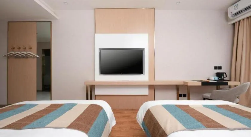 Bed in VX Hotel Beijing Daxing Wufutang Metro Station Zhongke Dianshanggu