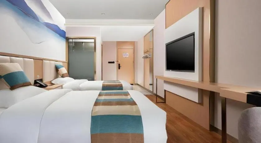 Bed in VX Hotel Beijing Daxing Wufutang Metro Station Zhongke Dianshanggu