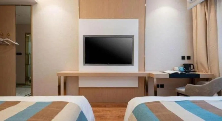 Bed in VX Hotel Beijing Daxing Wufutang Metro Station Zhongke Dianshanggu