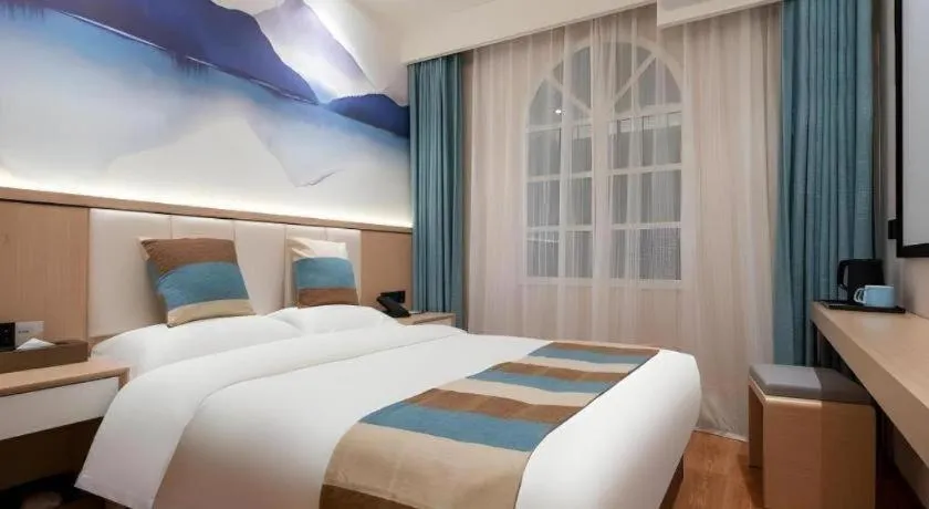 Bed in VX Hotel Beijing Daxing Wufutang Metro Station Zhongke Dianshanggu