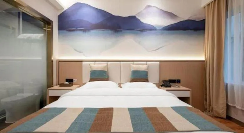 Bed in VX Hotel Beijing Daxing Wufutang Metro Station Zhongke Dianshanggu