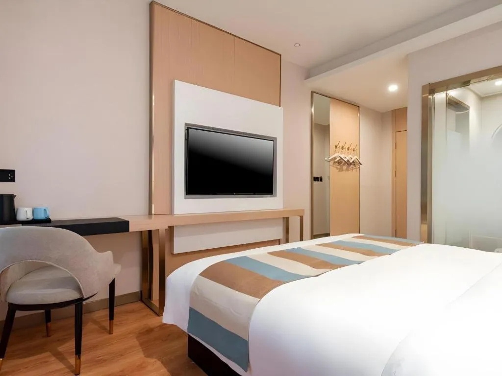 Bed in VX Hotel Beijing Daxing Wufutang Metro Station Zhongke Dianshanggu