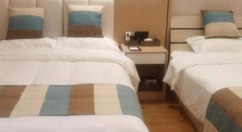 Bed in VX Hotel Beijing Daxing Wufutang Metro Station Zhongke Dianshanggu