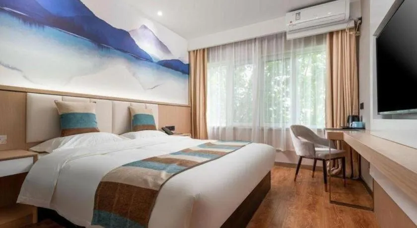 Bed in VX Hotel Beijing Daxing Wufutang Metro Station Zhongke Dianshanggu