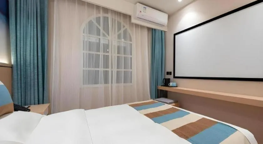 Bed in VX Hotel Beijing Daxing Wufutang Metro Station Zhongke Dianshanggu