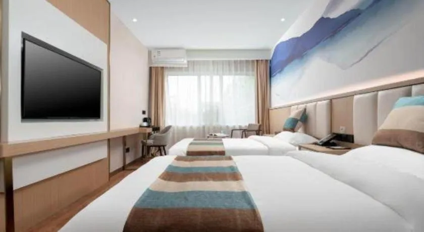 Bed in VX Hotel Beijing Daxing Wufutang Metro Station Zhongke Dianshanggu