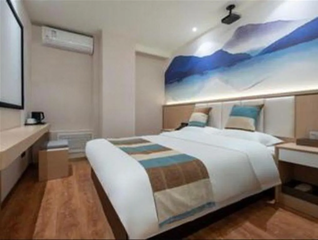 Bed in VX Hotel Beijing Daxing Wufutang Metro Station Zhongke Dianshanggu