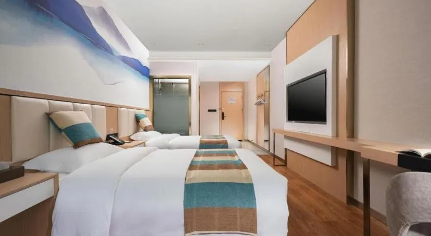 Bed in VX Hotel Beijing Daxing Wufutang Metro Station Zhongke Dianshanggu