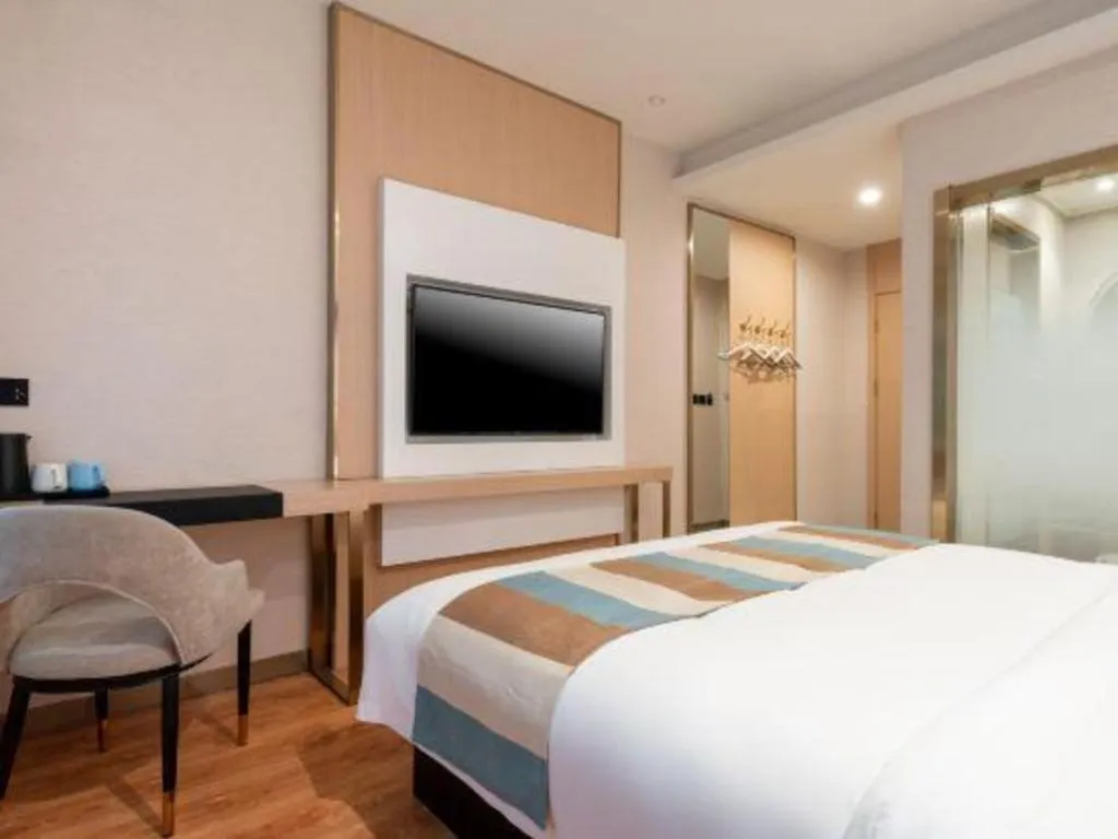 Bed in VX Hotel Beijing Daxing Wufutang Metro Station Zhongke Dianshanggu