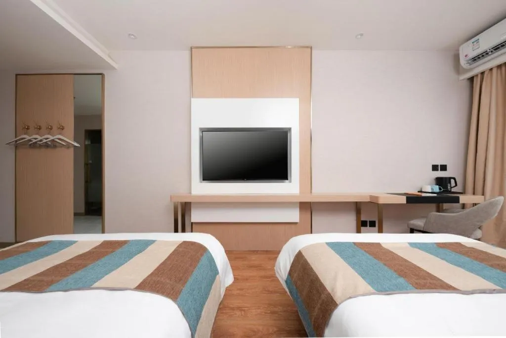 Bed in VX Hotel Beijing Daxing Wufutang Metro Station Zhongke Dianshanggu