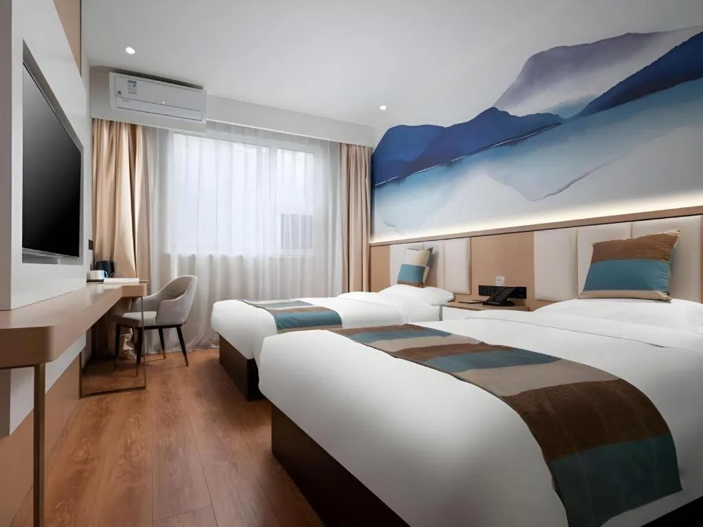 Bed in VX Hotel Beijing Daxing Wufutang Metro Station Zhongke Dianshanggu