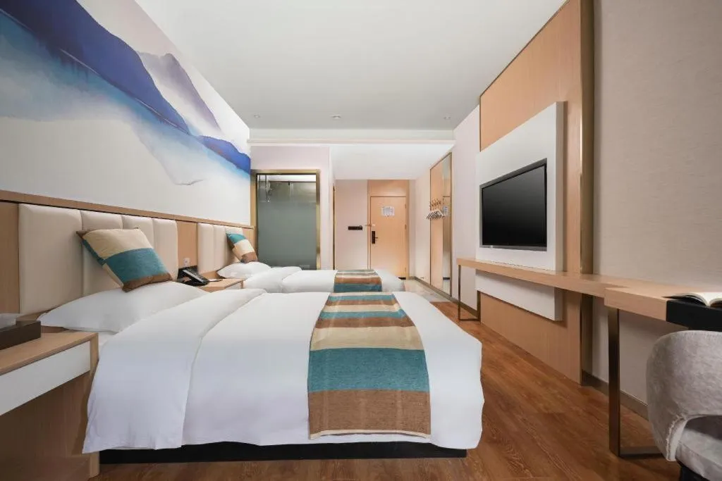 Bed in VX Hotel Beijing Daxing Wufutang Metro Station Zhongke Dianshanggu