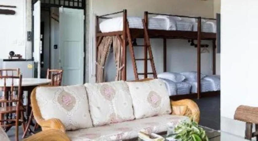 Bed in Uthai Heritage Hotel