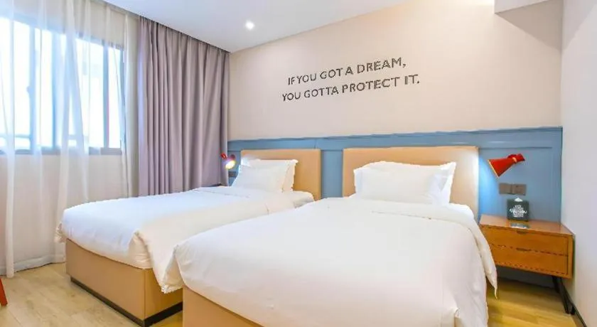 Bed in Premier City Comfort Hotel Yangzhou Shouxi Lake West Gate Weiyang Road Siji Garden