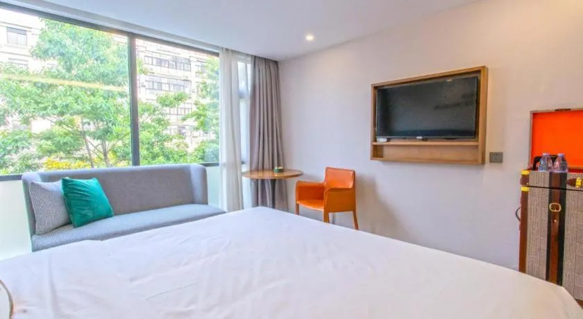 Bed in Premier City Comfort Hotel Yangzhou Shouxi Lake West Gate Weiyang Road Siji Garden