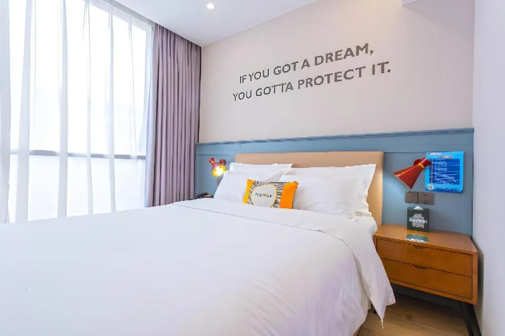 Bed in Premier City Comfort Hotel Yangzhou Shouxi Lake West Gate Weiyang Road Siji Garden