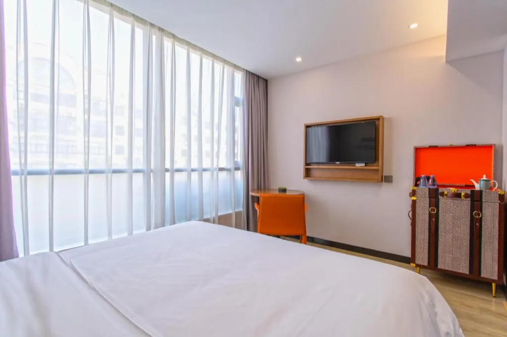 Bed in Premier City Comfort Hotel Yangzhou Shouxi Lake West Gate Weiyang Road Siji Garden
