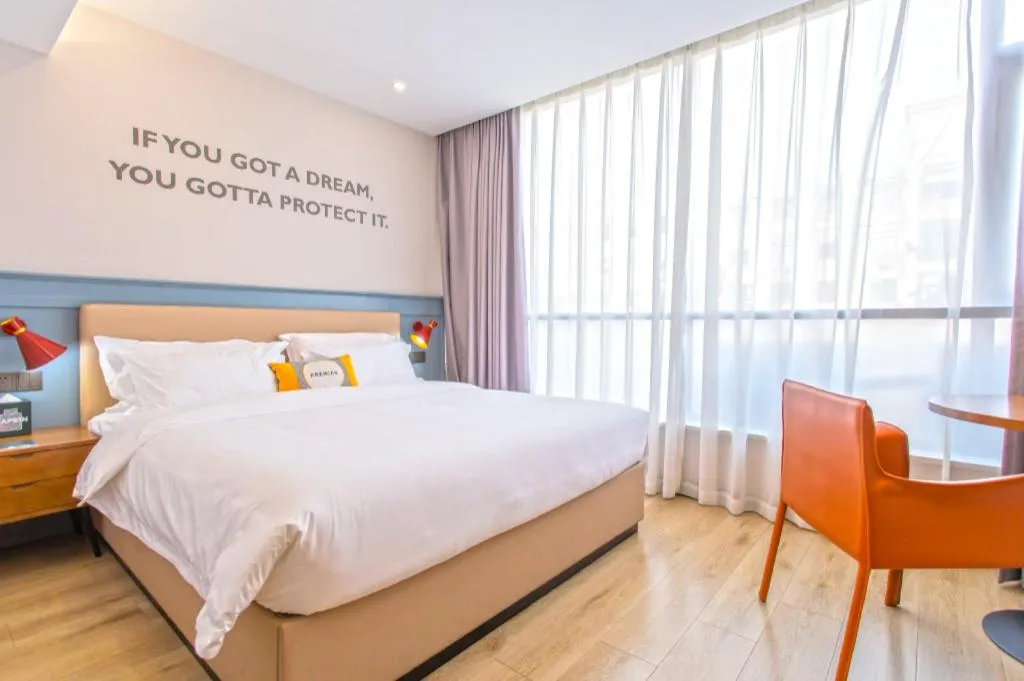 Bed in Premier City Comfort Hotel Yangzhou Shouxi Lake West Gate Weiyang Road Siji Garden