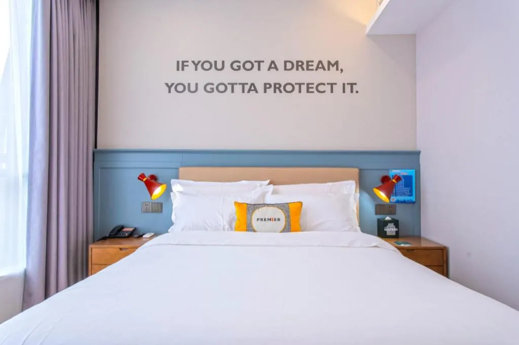 Bed in Premier City Comfort Hotel Yangzhou Shouxi Lake West Gate Weiyang Road Siji Garden