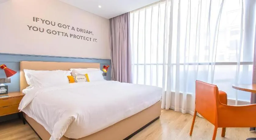 Bed in Premier City Comfort Hotel Yangzhou Shouxi Lake West Gate Weiyang Road Siji Garden