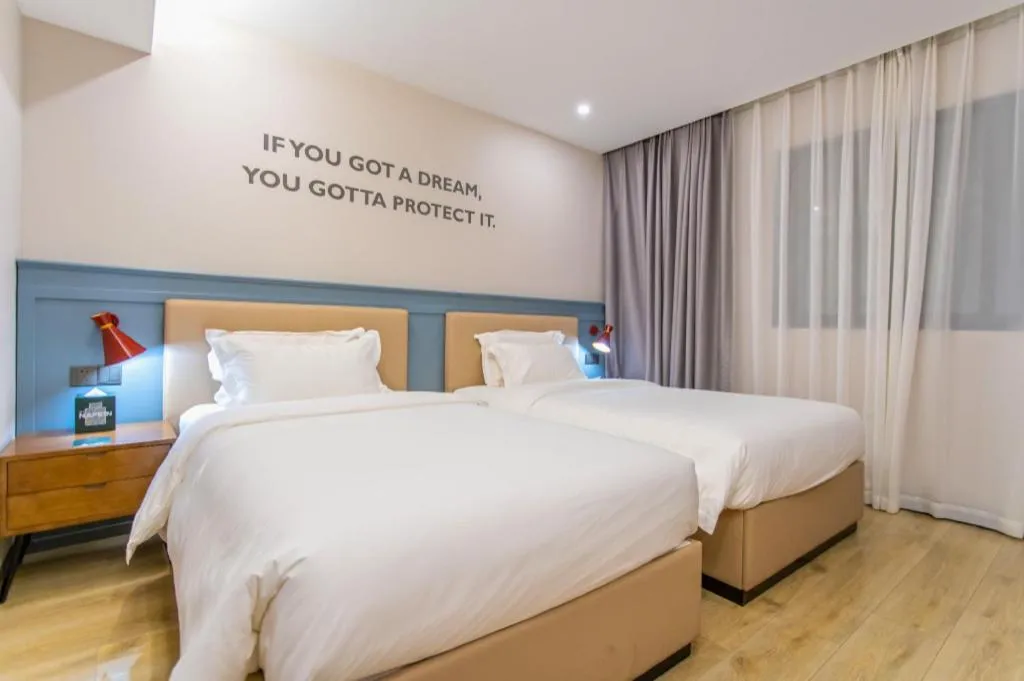 Bed in Premier City Comfort Hotel Yangzhou Shouxi Lake West Gate Weiyang Road Siji Garden