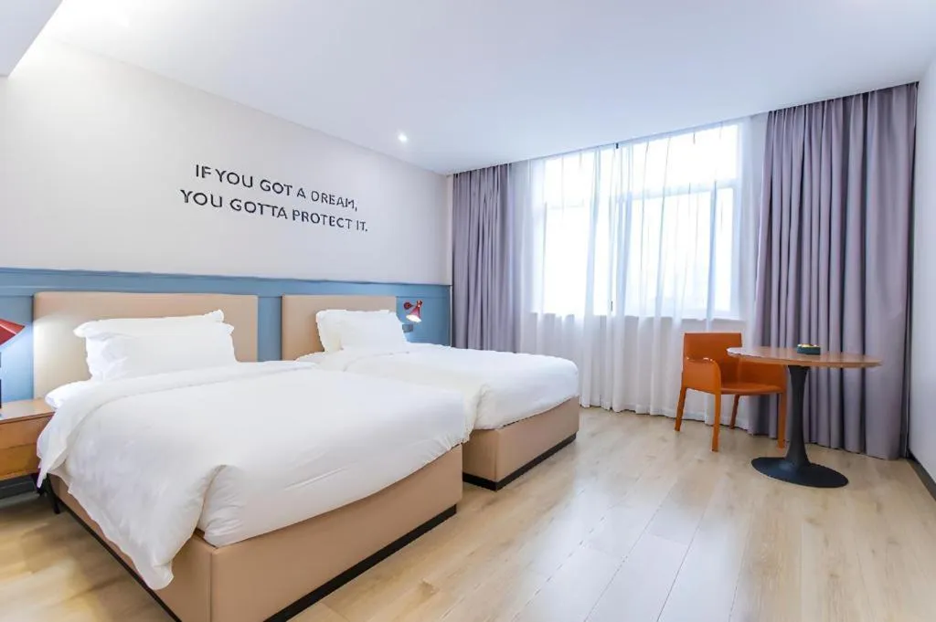 Bed in Premier City Comfort Hotel Yangzhou Shouxi Lake West Gate Weiyang Road Siji Garden