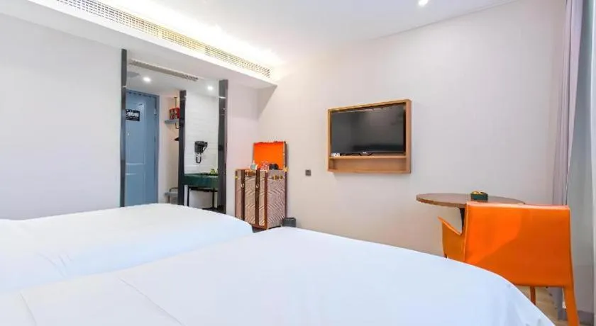Bed in Premier City Comfort Hotel Yangzhou Shouxi Lake West Gate Weiyang Road Siji Garden