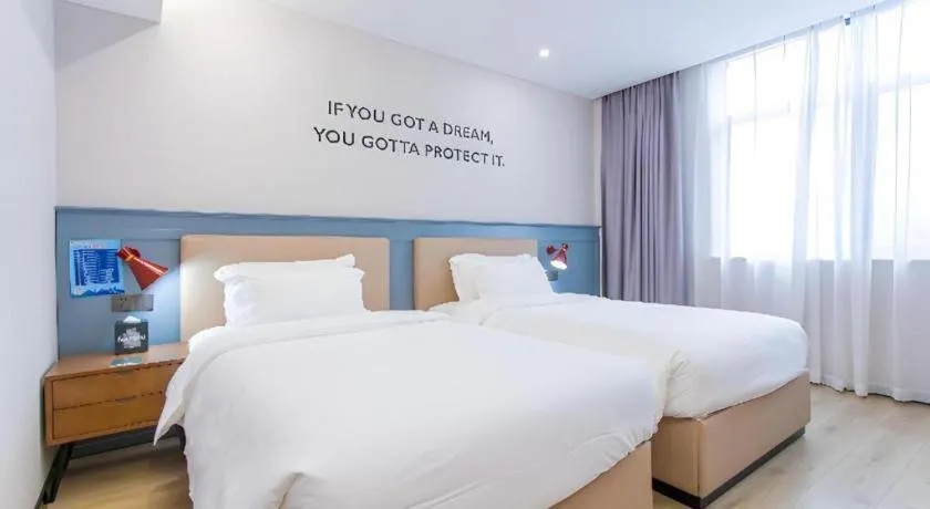 Bed in Premier City Comfort Hotel Yangzhou Shouxi Lake West Gate Weiyang Road Siji Garden