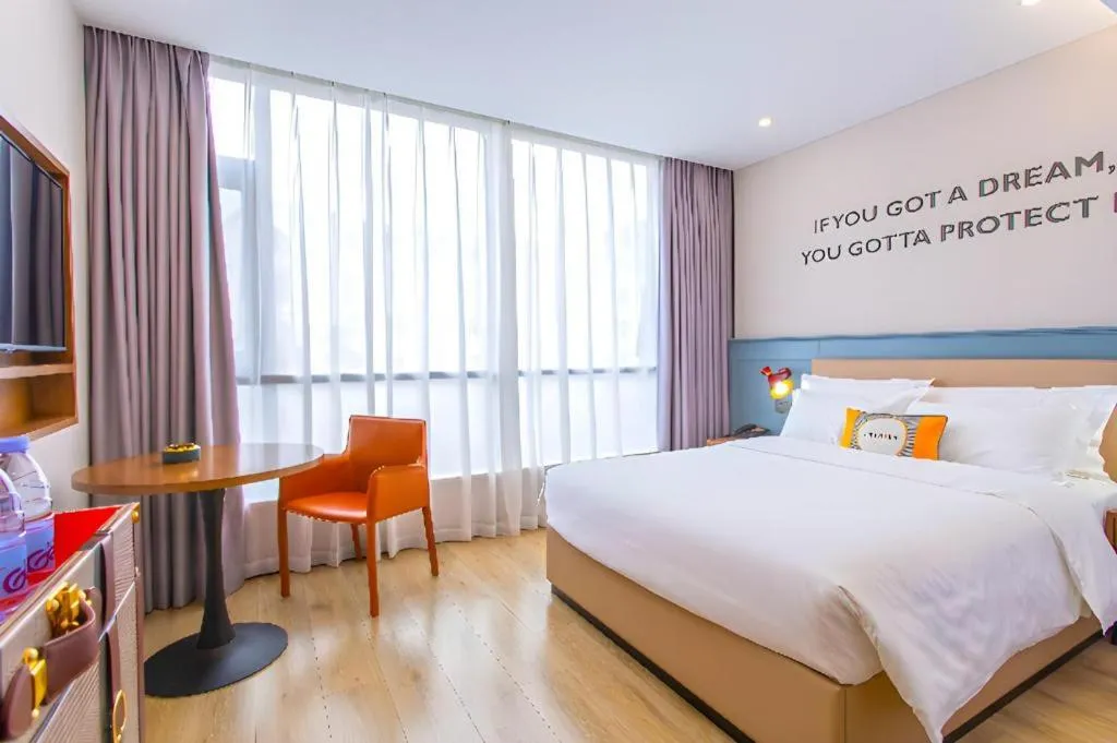 Bed in Premier City Comfort Hotel Yangzhou Shouxi Lake West Gate Weiyang Road Siji Garden