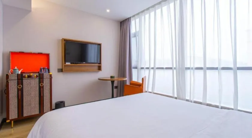 Bed in Premier City Comfort Hotel Yangzhou Shouxi Lake West Gate Weiyang Road Siji Garden