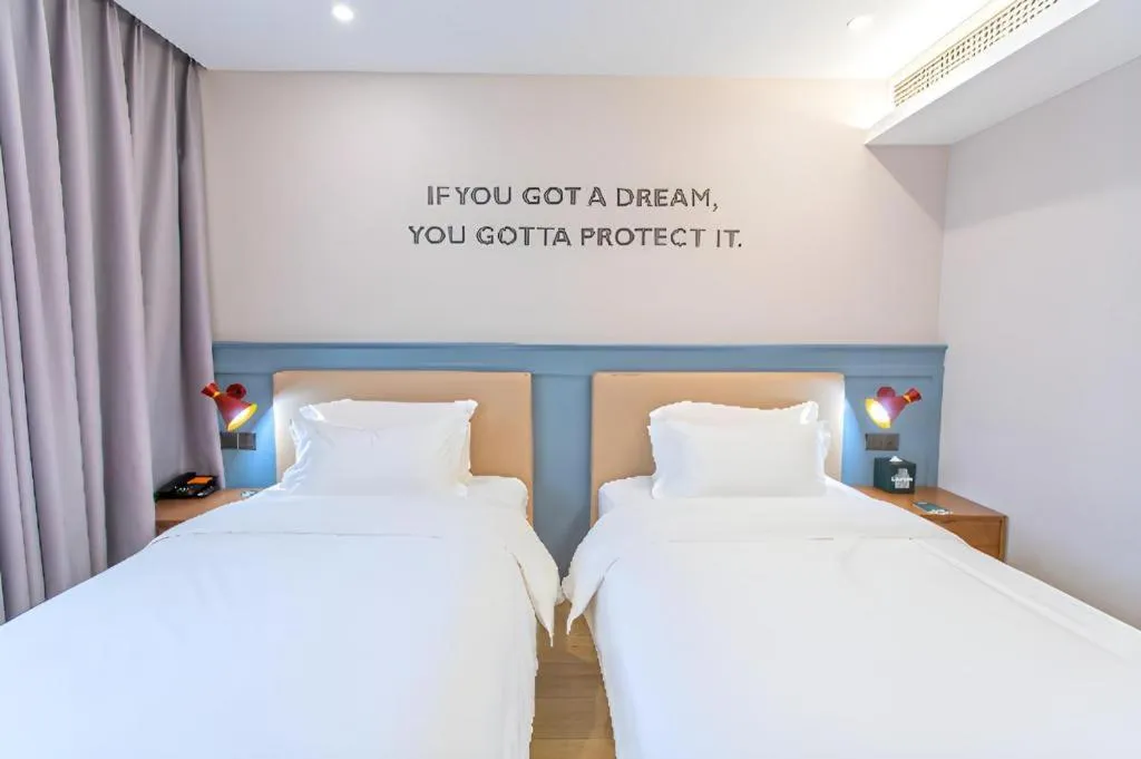 Bed in Premier City Comfort Hotel Yangzhou Shouxi Lake West Gate Weiyang Road Siji Garden