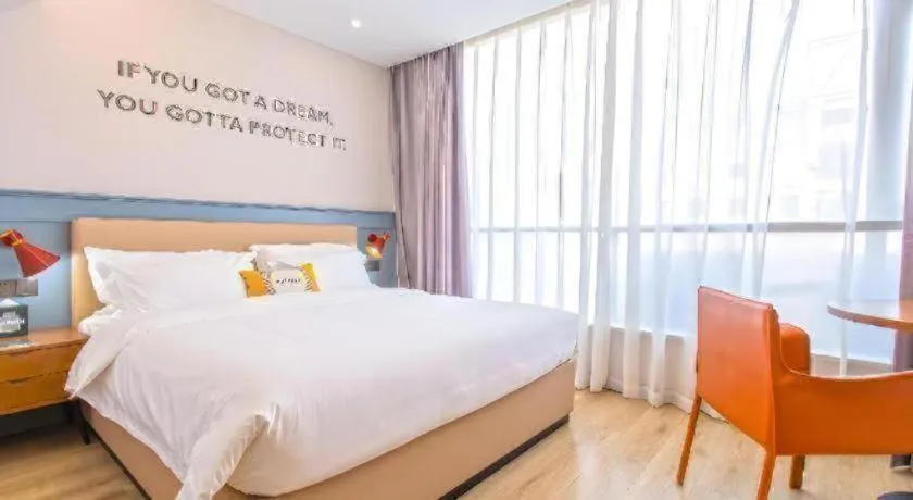 Bed in Premier City Comfort Hotel Yangzhou Shouxi Lake West Gate Weiyang Road Siji Garden