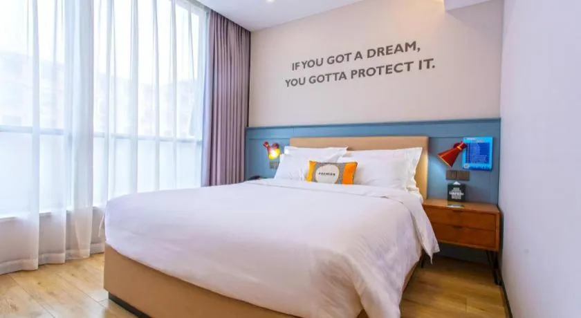 Bed in Premier City Comfort Hotel Yangzhou Shouxi Lake West Gate Weiyang Road Siji Garden