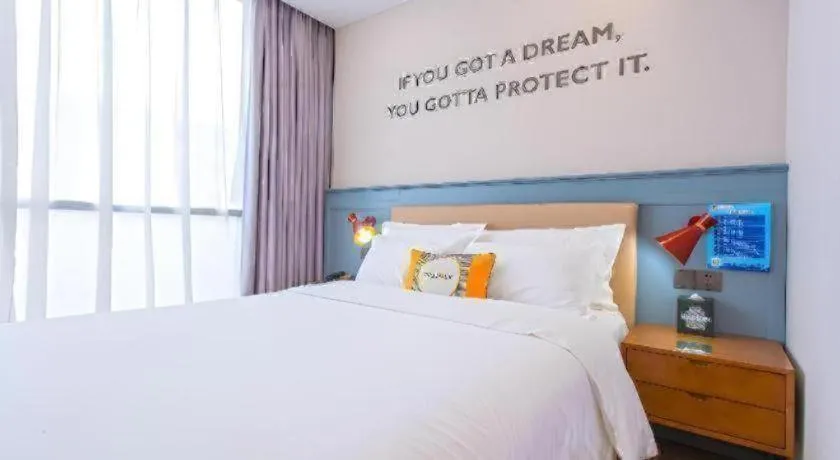 Bed in Premier City Comfort Hotel Yangzhou Shouxi Lake West Gate Weiyang Road Siji Garden