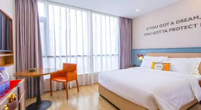 Bed in Premier City Comfort Hotel Yangzhou Shouxi Lake West Gate Weiyang Road Siji Garden