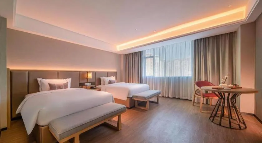 Bed in Echeng Hotel Hezhou Shizheng Square