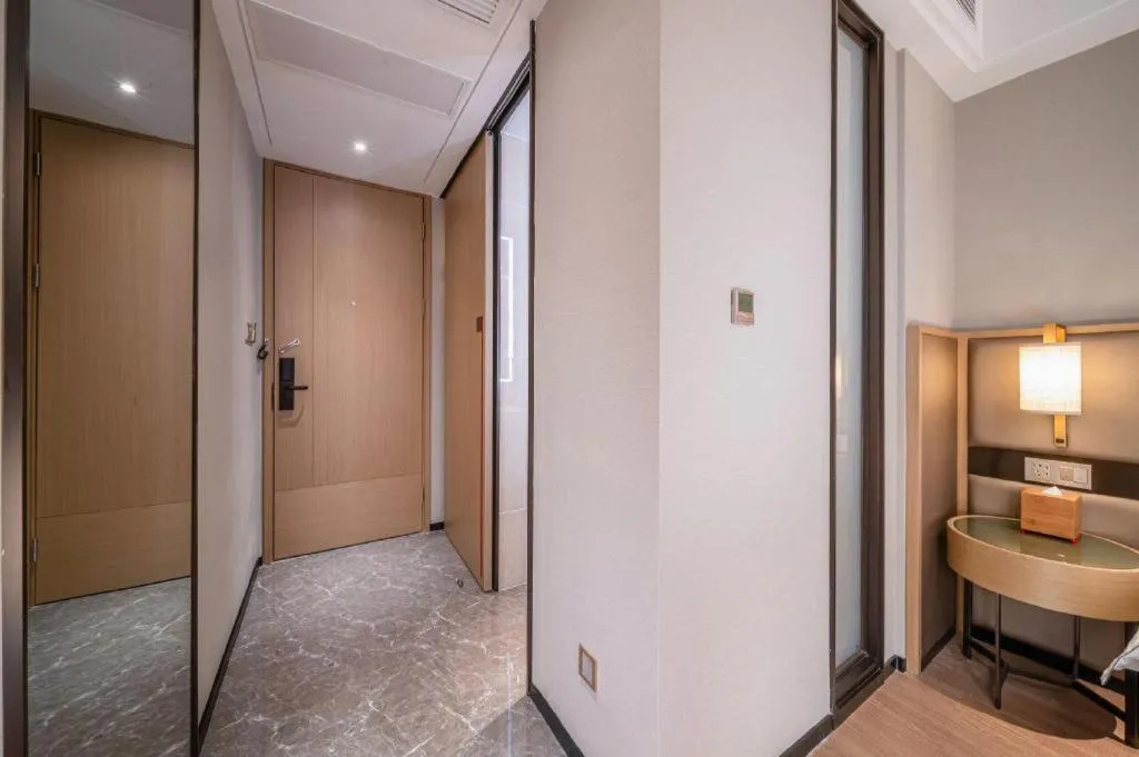 Bed in Echeng Hotel Hezhou Shizheng Square