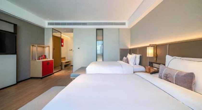 Bed in Echeng Hotel Hezhou Shizheng Square