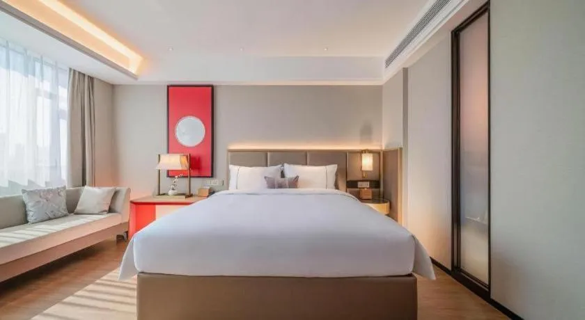 Bed in Echeng Hotel Hezhou Shizheng Square