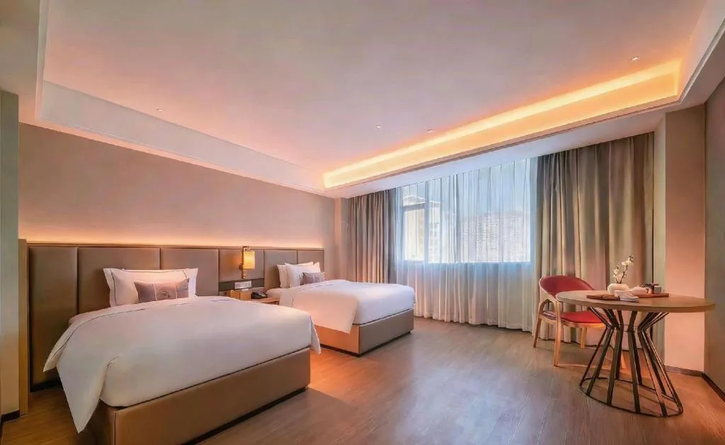 Bed in Echeng Hotel Hezhou Shizheng Square
