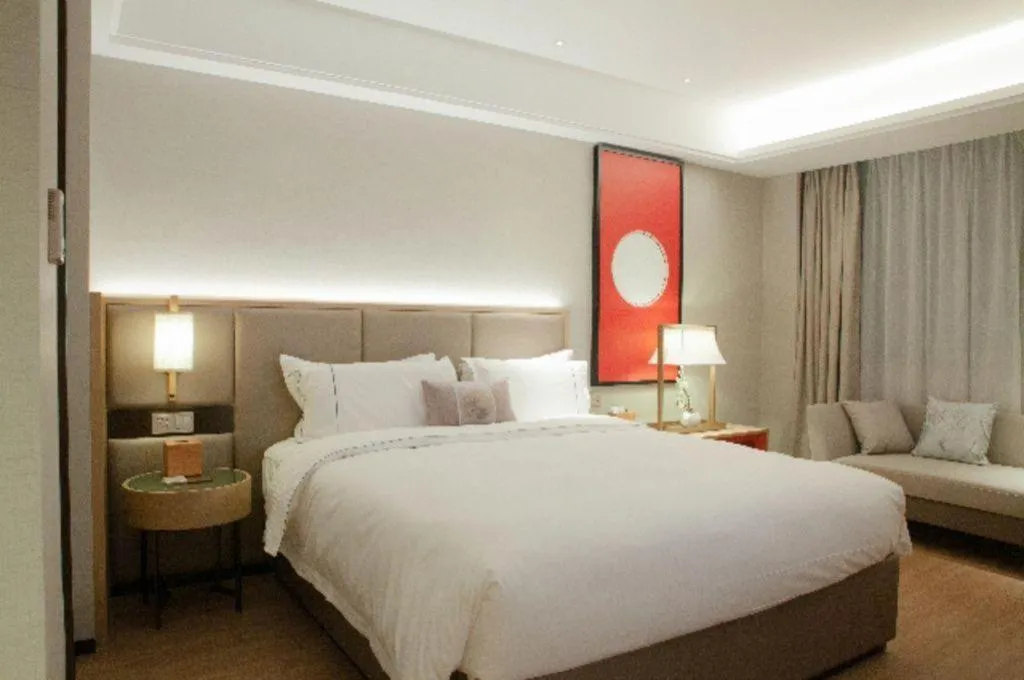 Bed in Echeng Hotel Hezhou Shizheng Square