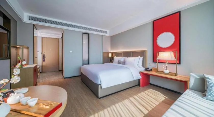 Bed in Echeng Hotel Hezhou Shizheng Square