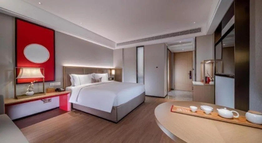 Bed in Echeng Hotel Hezhou Shizheng Square