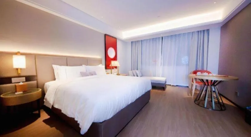 Bed in Echeng Hotel Hezhou Shizheng Square