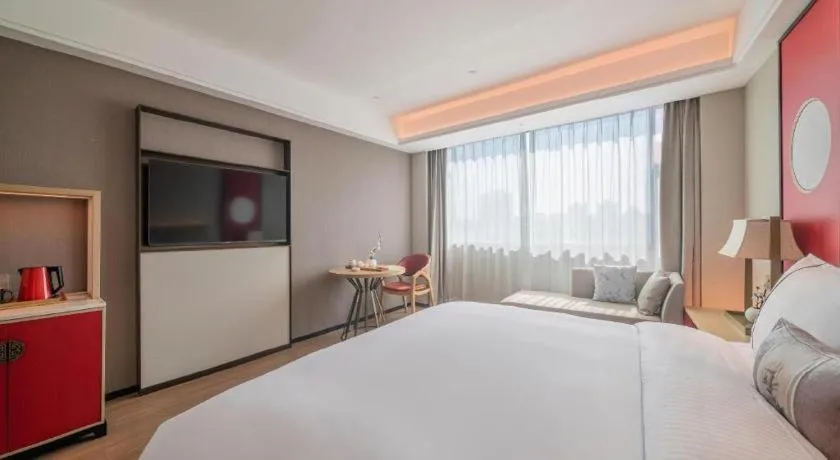 Bed in Echeng Hotel Hezhou Shizheng Square