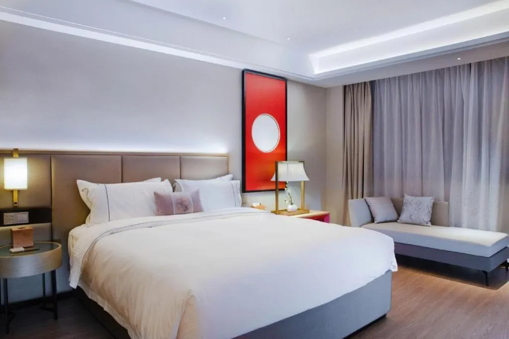 Bed in Echeng Hotel Hezhou Shizheng Square