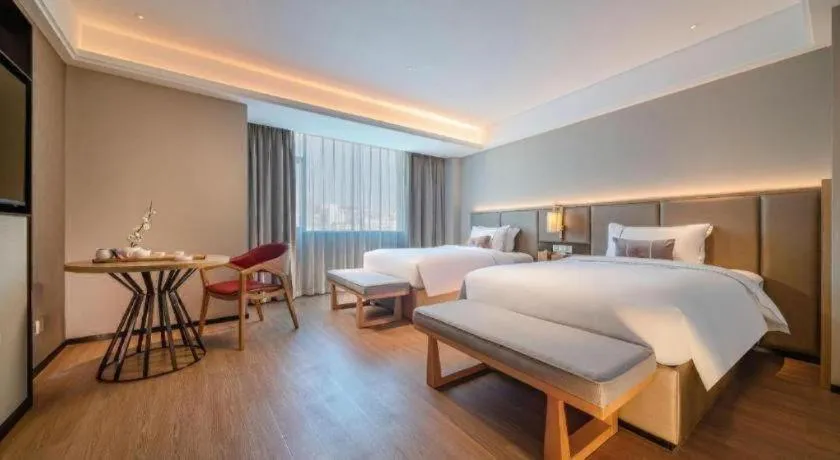 Bed in Echeng Hotel Hezhou Shizheng Square