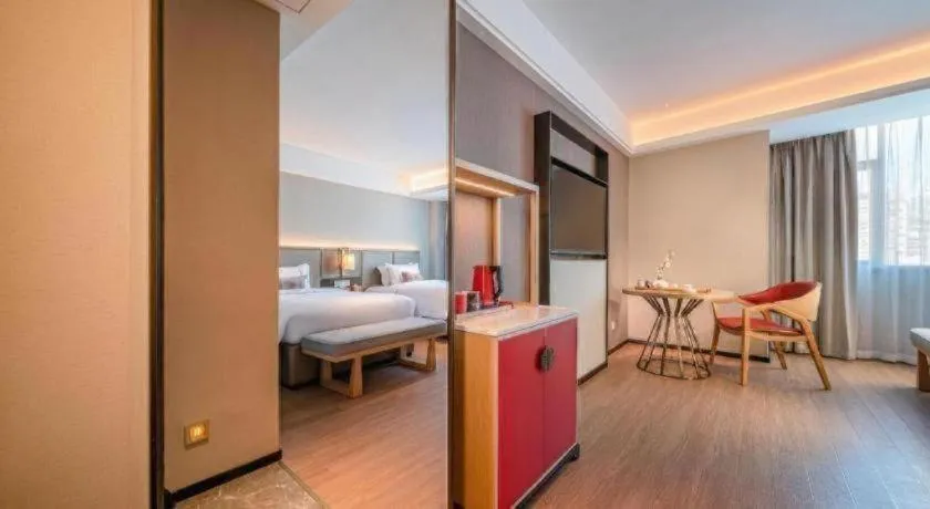 Bed in Echeng Hotel Hezhou Shizheng Square